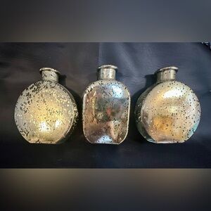 Set of three decretive bottles